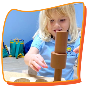 3-year-old girl playing with blocks